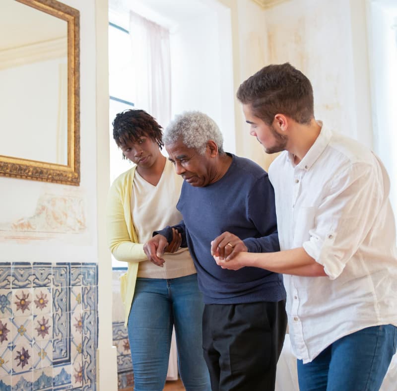 Support worker helping participant with personal care